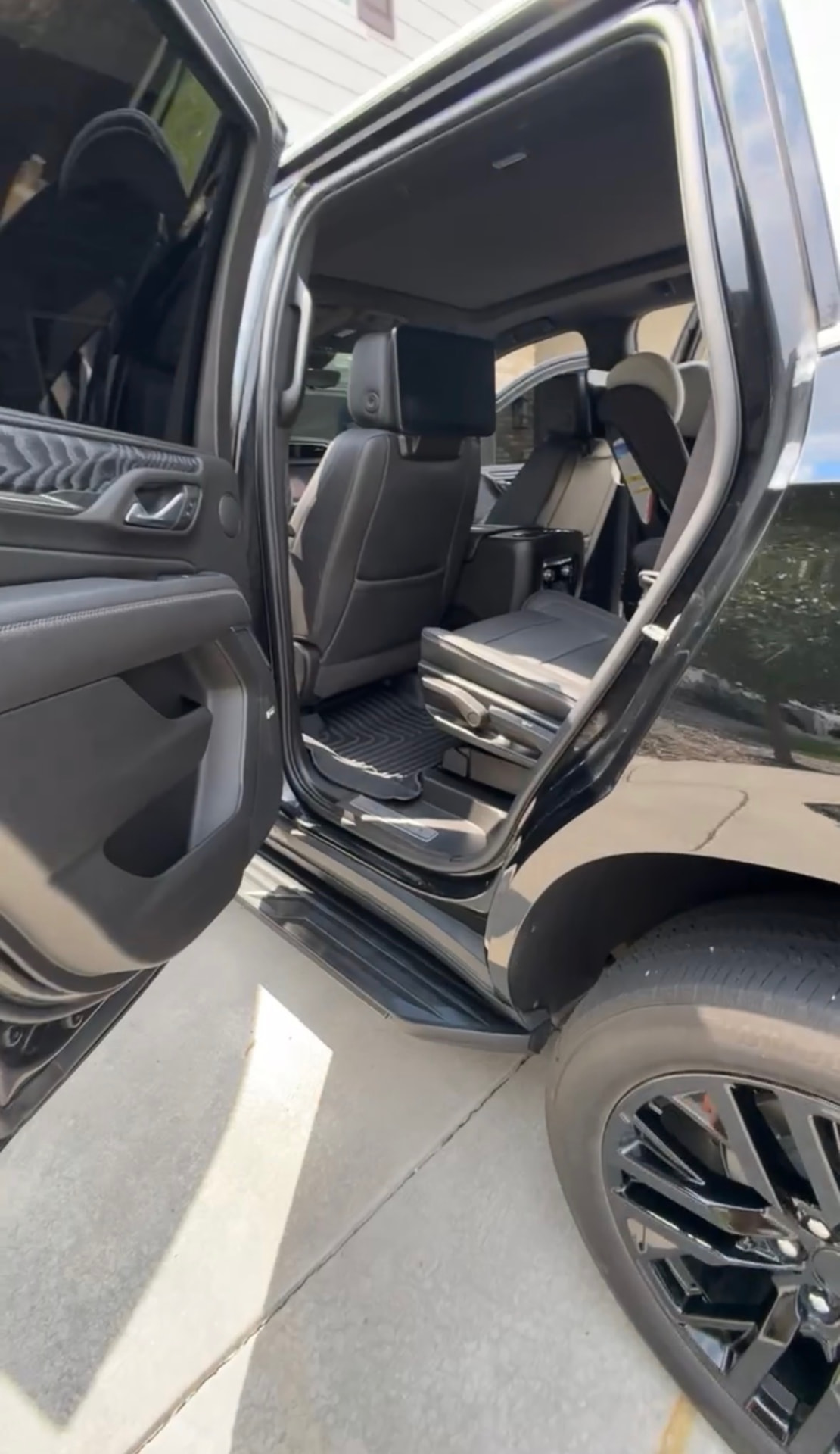 Black pickup truck open doors ready for interior detailing
